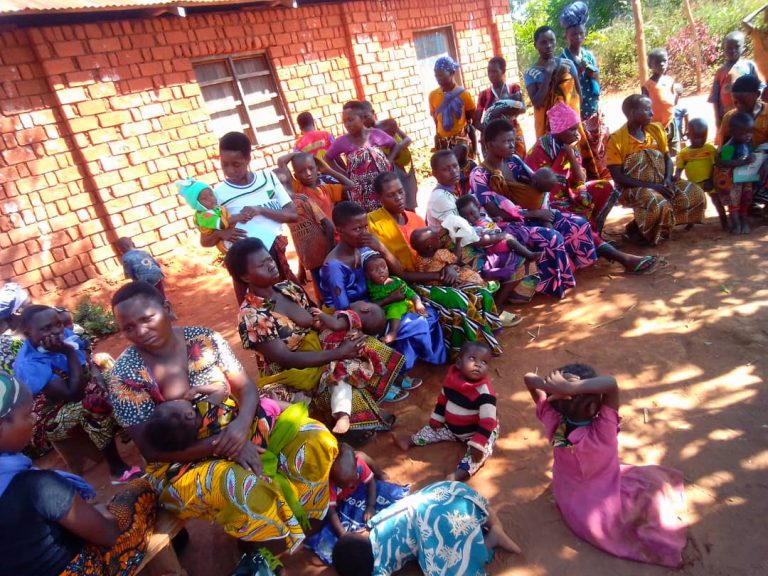 RHAI healthcare workers providing community health and nutrition services to vulnerable families in rural Moshi.